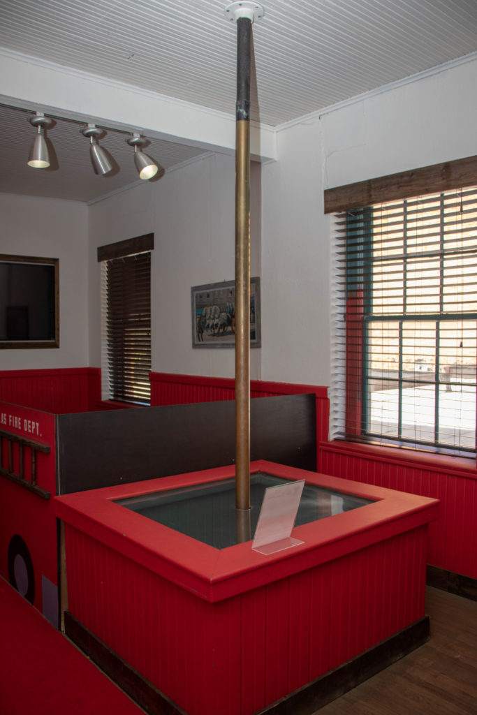 picture of a fire pole in fire museum 