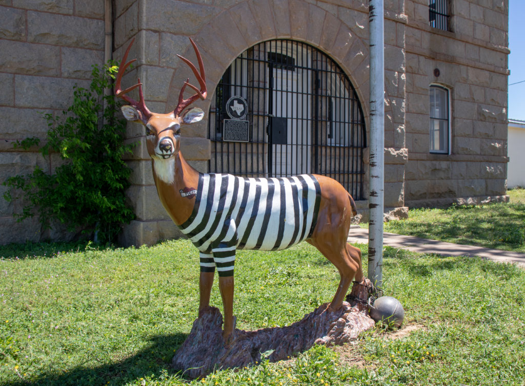 picture of red top jail deer statue 