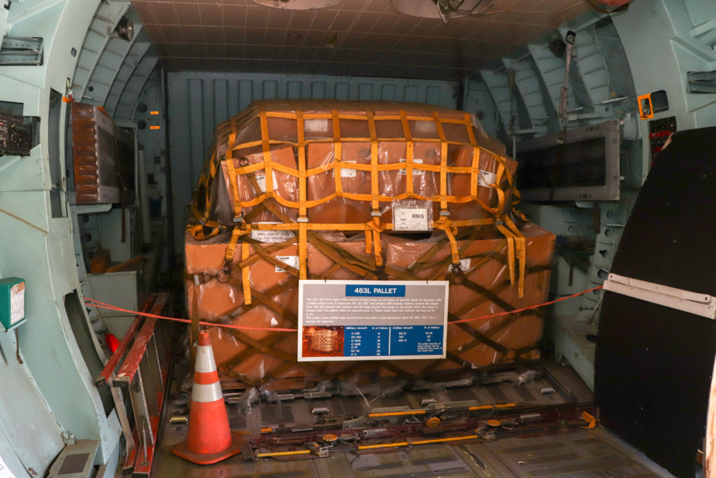 picture of a military cargo pallet onboard an airplane 